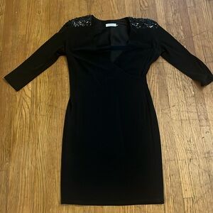 Calvin Klein black shoulder sparkle dress.